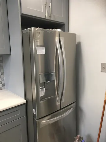 a close view of a refrigerator in kitchen