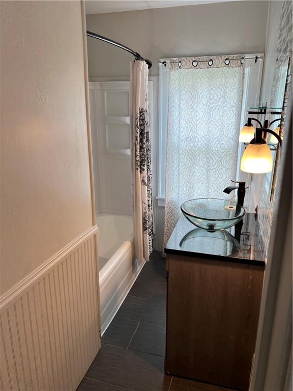 406 Service Avenue Sharon, PA 16146 - Photo 11 of 17 a bathroom with a granite countertop sink a toilet and shower