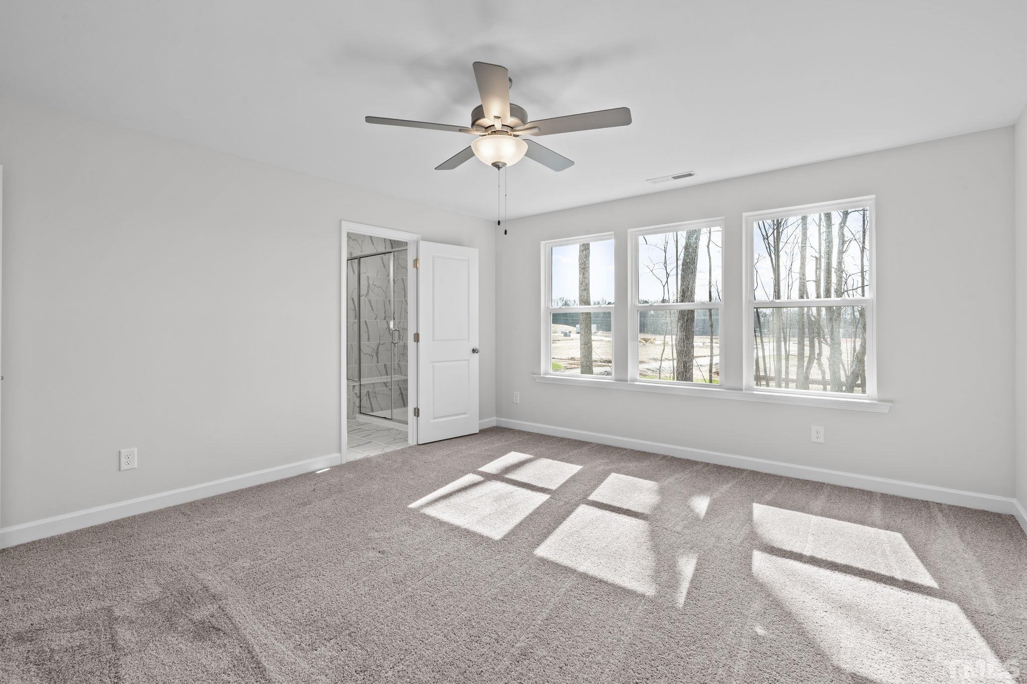 516 Craftsman Rdg Trail Knightdale, NC 27545 - Photo 18 of 45 a view of an empty room with a window