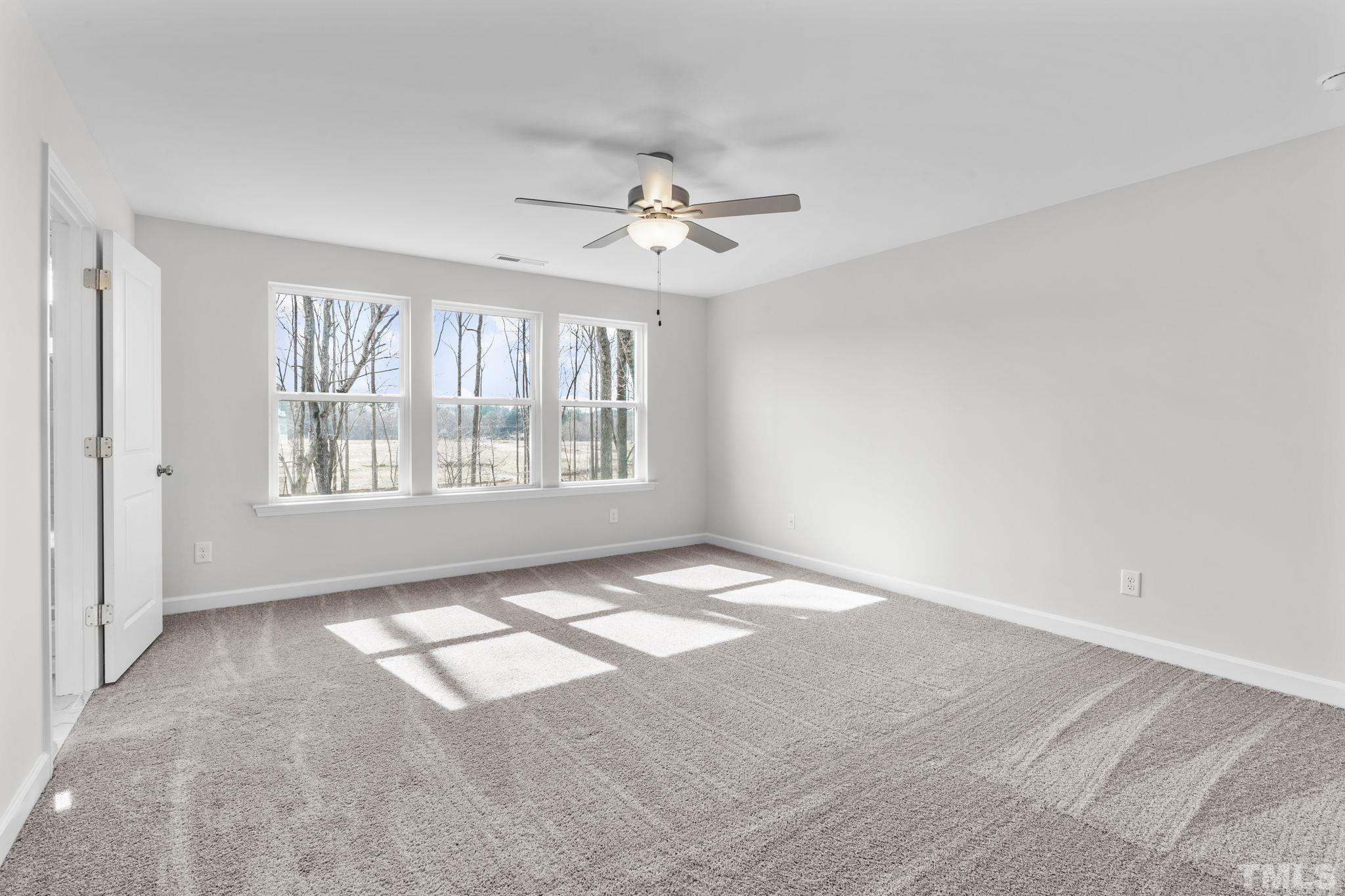 516 Craftsman Rdg Trail Knightdale, NC 27545 - Photo 20 of 45 a view of an empty room with a window