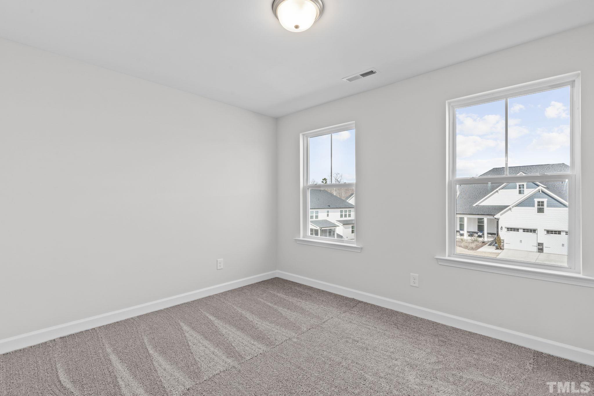 516 Craftsman Rdg Trail Knightdale, NC 27545 - Photo 24 of 45 a view of an empty room with a window