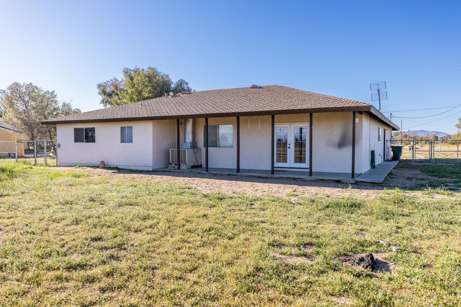 1960 Autumn Avenue Ridgecrest, CA 93555 - Photo 31 of 37 a view of a house with a yard