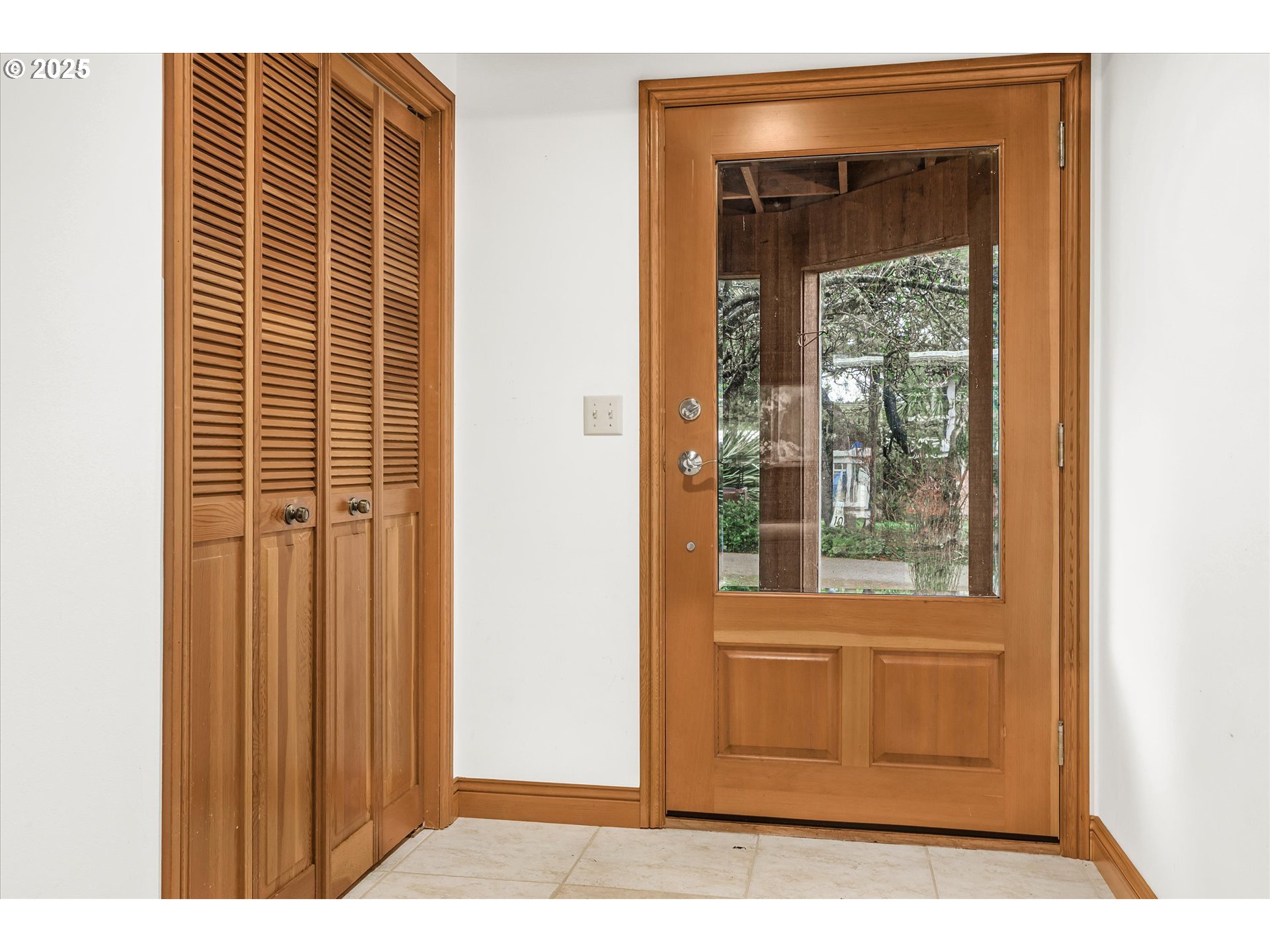 327 Lemwick Lane Yachats, OR 97498 - Photo 13 of 41 a view of a door and a window