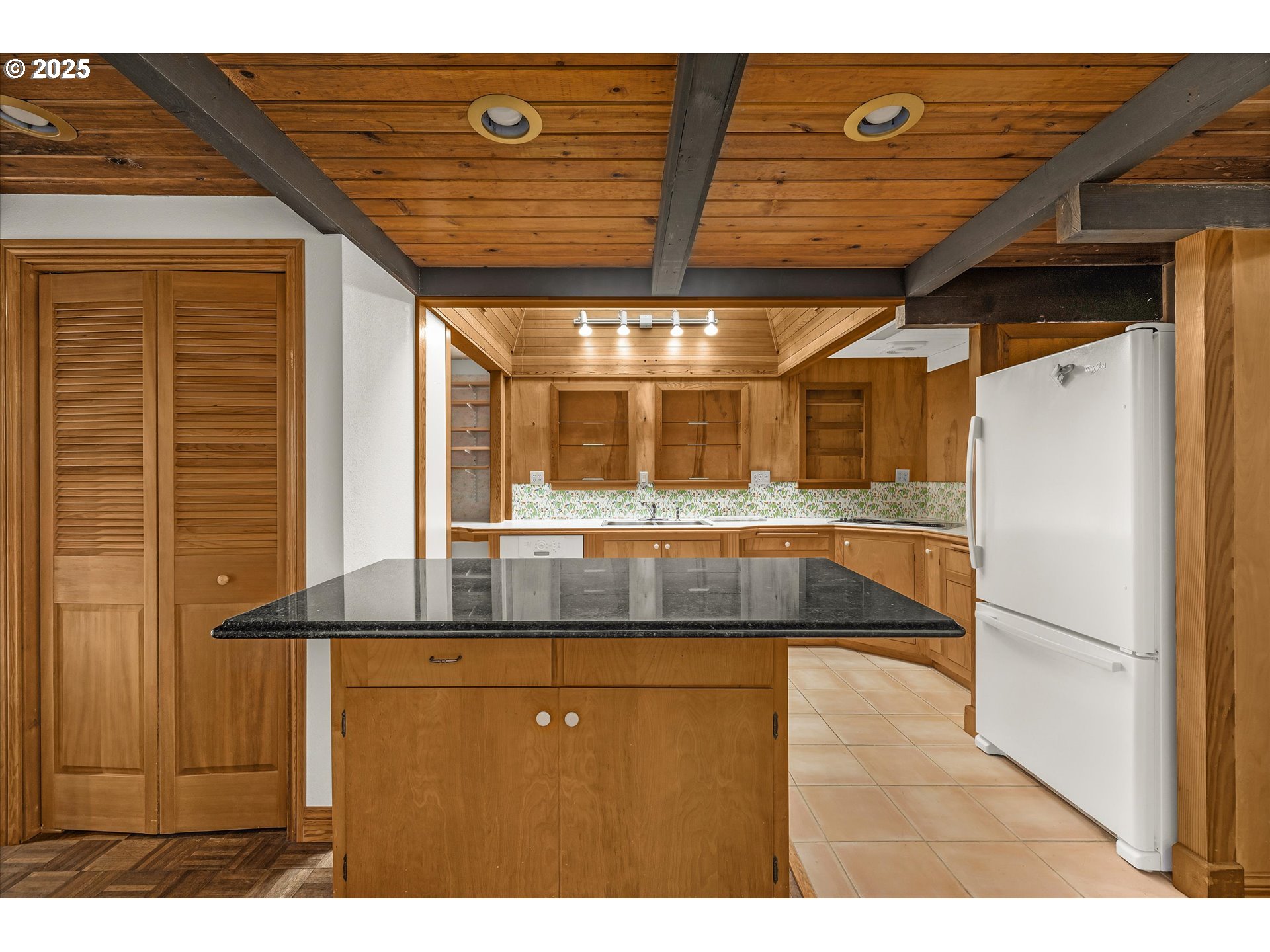 327 Lemwick Lane Yachats, OR 97498 - Photo 19 of 41 a view of a living room with a wooden floor