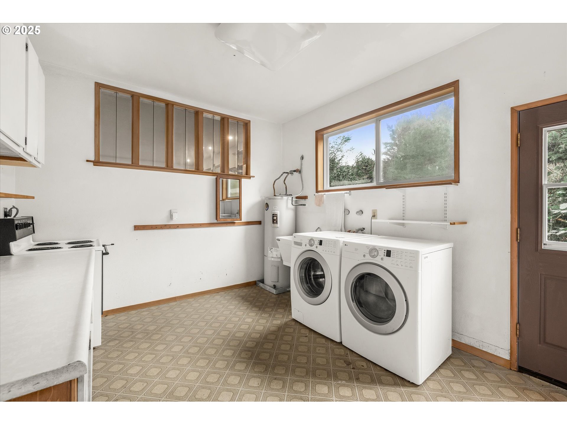 327 Lemwick Lane Yachats, OR 97498 - Photo 24 of 41 a utility room with dryer and washer