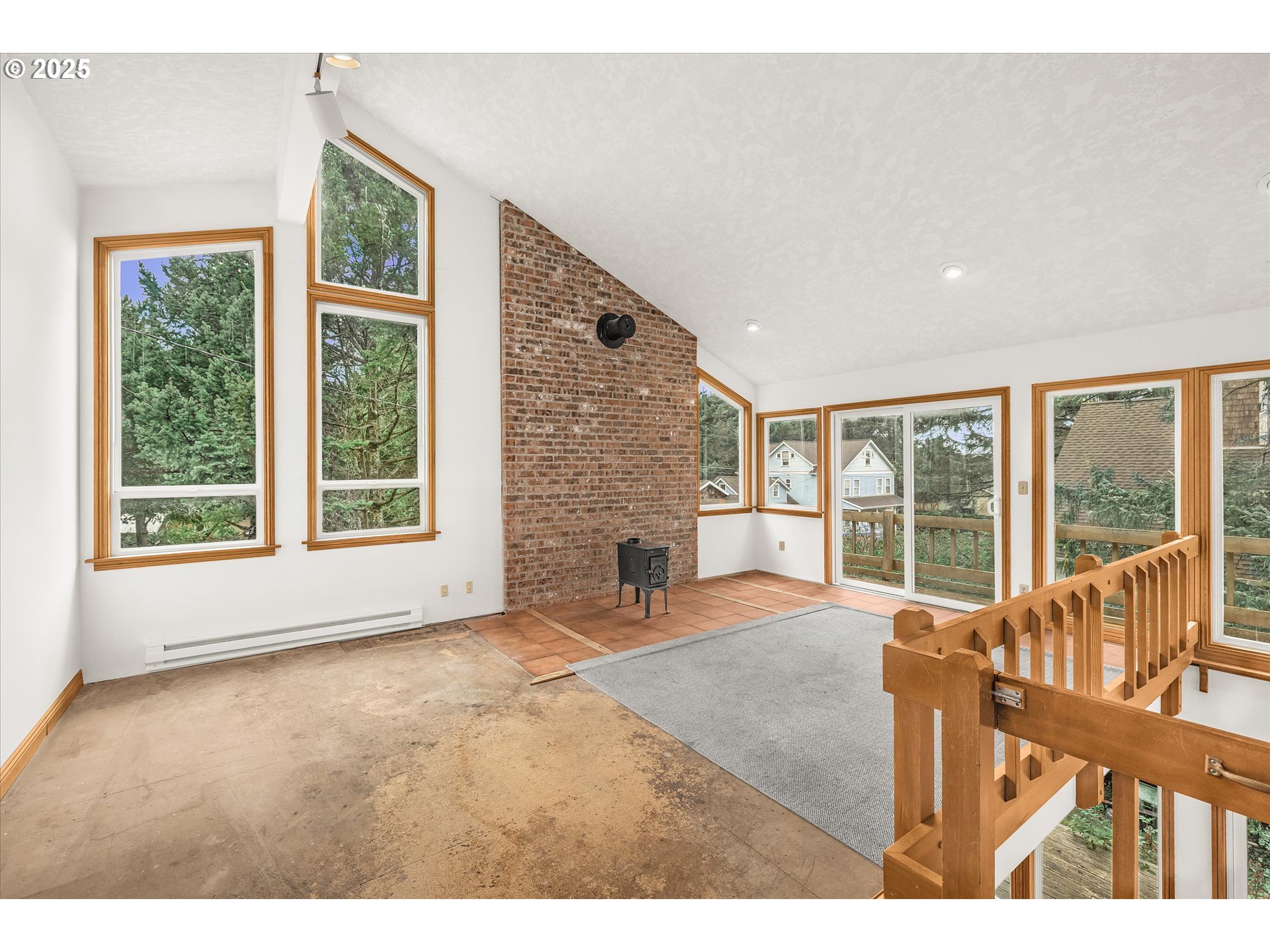 327 Lemwick Lane Yachats, OR 97498 - Photo 28 of 41 a house view with a garden and balcony