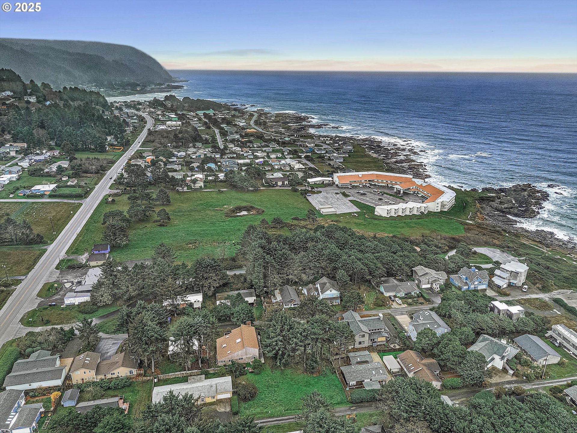327 Lemwick Lane Yachats, OR 97498 - Photo 38 of 41 a view of a lake with a mountain