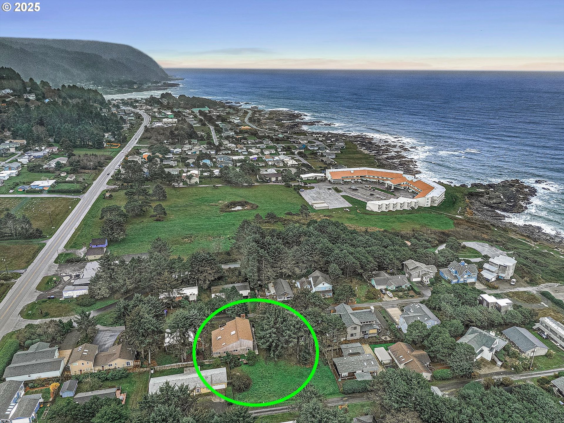 327 Lemwick Lane Yachats, OR 97498 - Photo 39 of 41 a view of a lake with a mountain