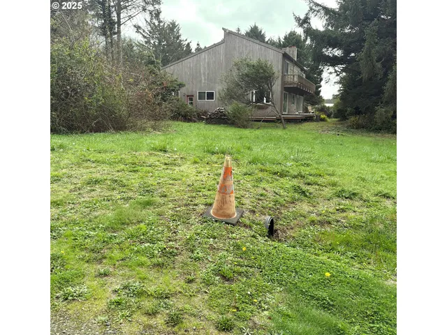 a fire hydrant in the middle of a field