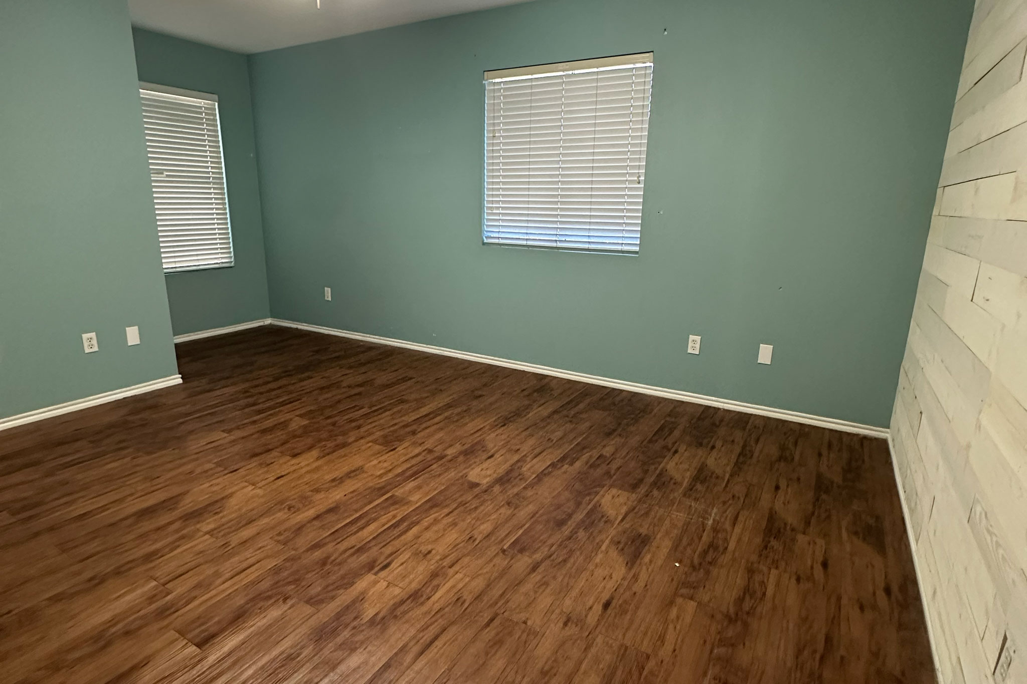 3309 Crownover Street Austin, TX 78725 - Photo 4 of 12 a view of a livingroom with wooden floor