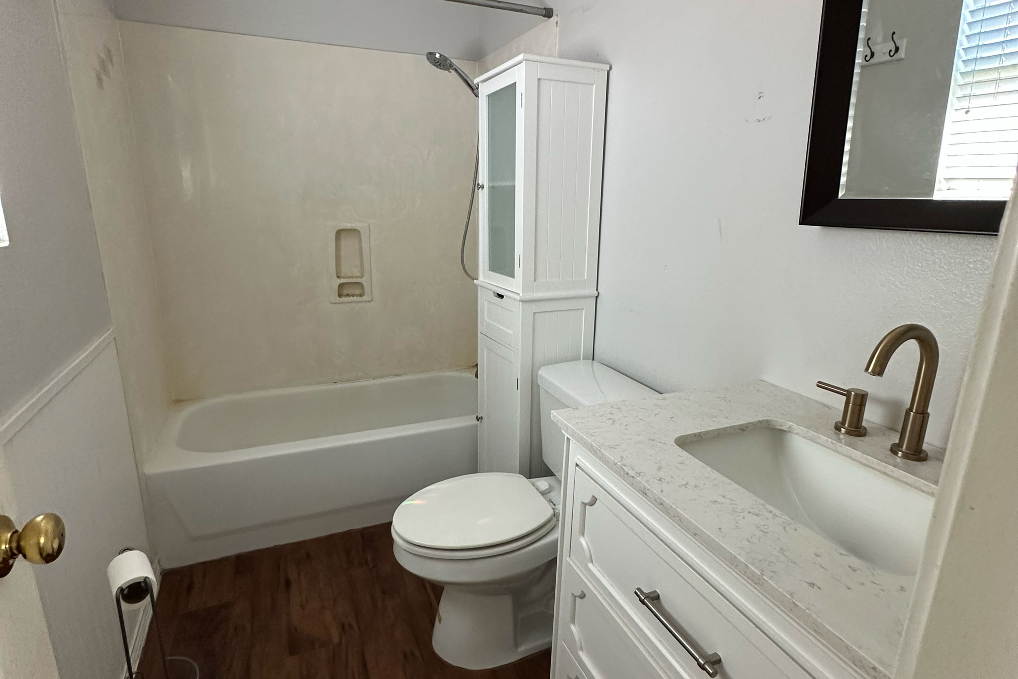3309 Crownover Street Austin, TX 78725 - Photo 5 of 12 a bathroom with a toilet sink vanity tub and shower