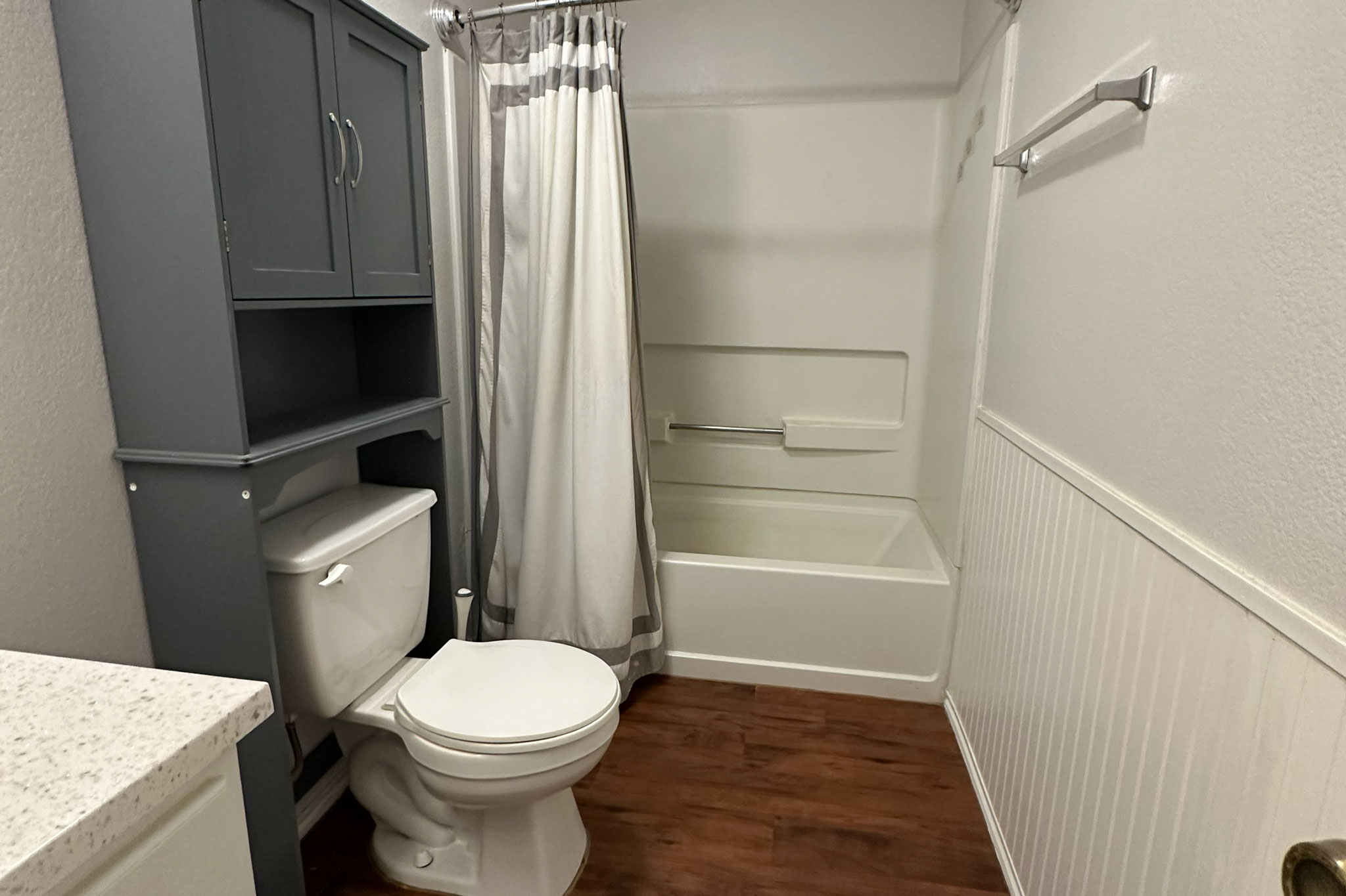 3309 Crownover Street Austin, TX 78725 - Photo 8 of 12 a bathroom with a toilet and a shower