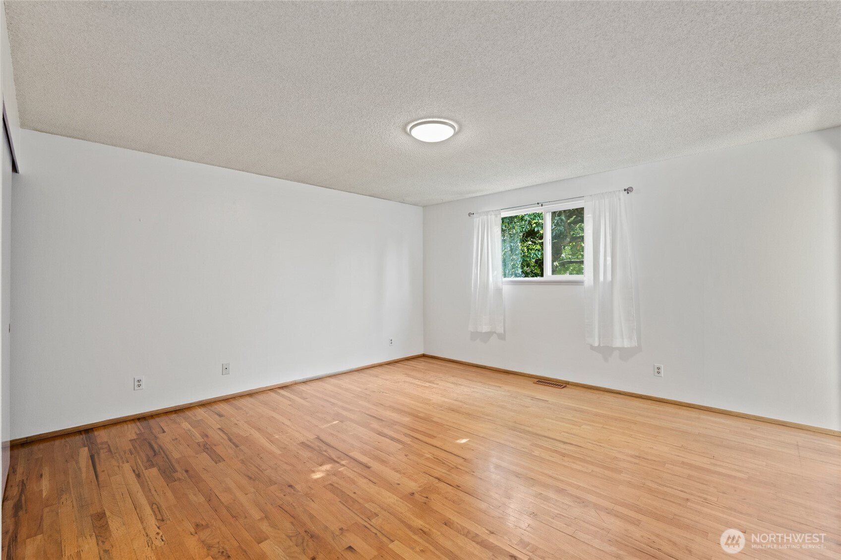8506 224th Street Southwest Edmonds, WA 98026 - Photo 12 of 19 wooden floor in a room