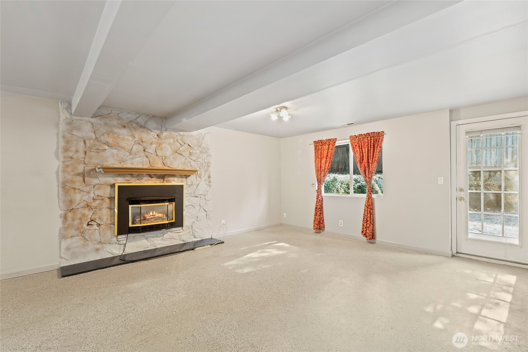 8506 224th Street Southwest Edmonds, WA 98026 - Photo 19 of 19 an empty room with windows and fireplace