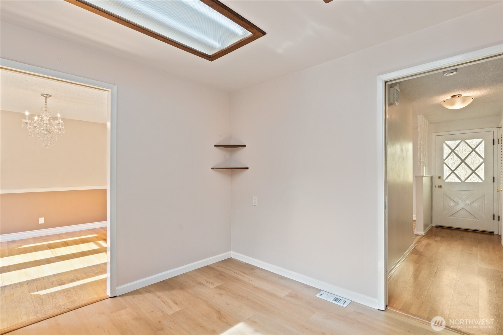 8506 224th Street Southwest Edmonds, WA 98026 - Photo 10 of 19 a view of empty room with wooden floor