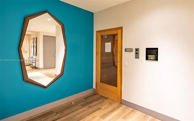 a play room with furniture and a chandelier