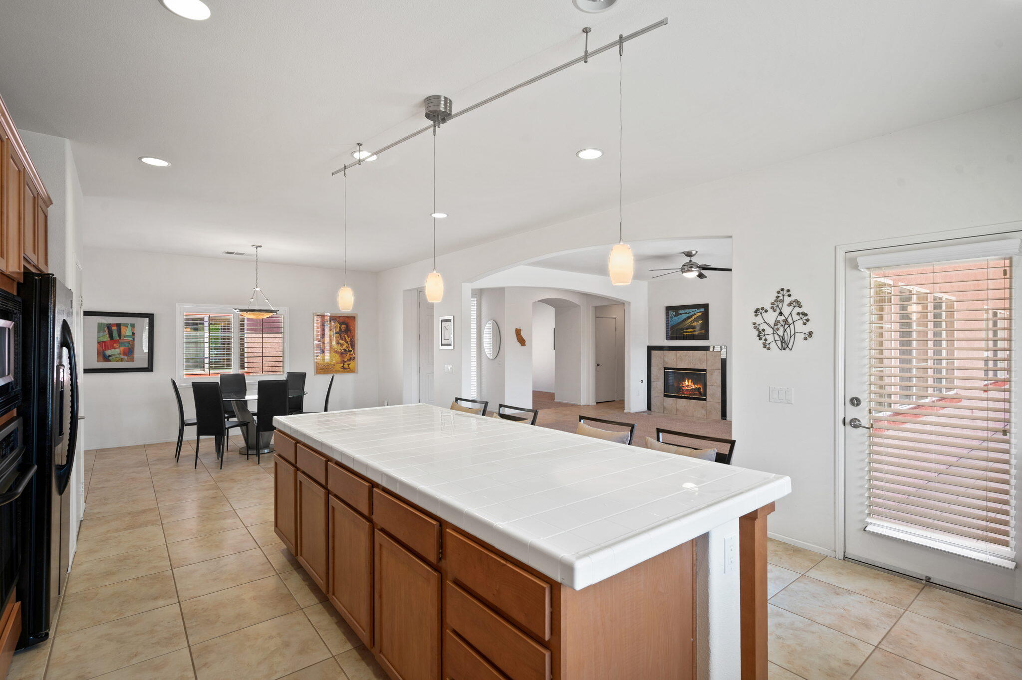82809 Larsen Drive Indio, CA 92203 - Photo 12 of 34 a large kitchen with a table and chairs