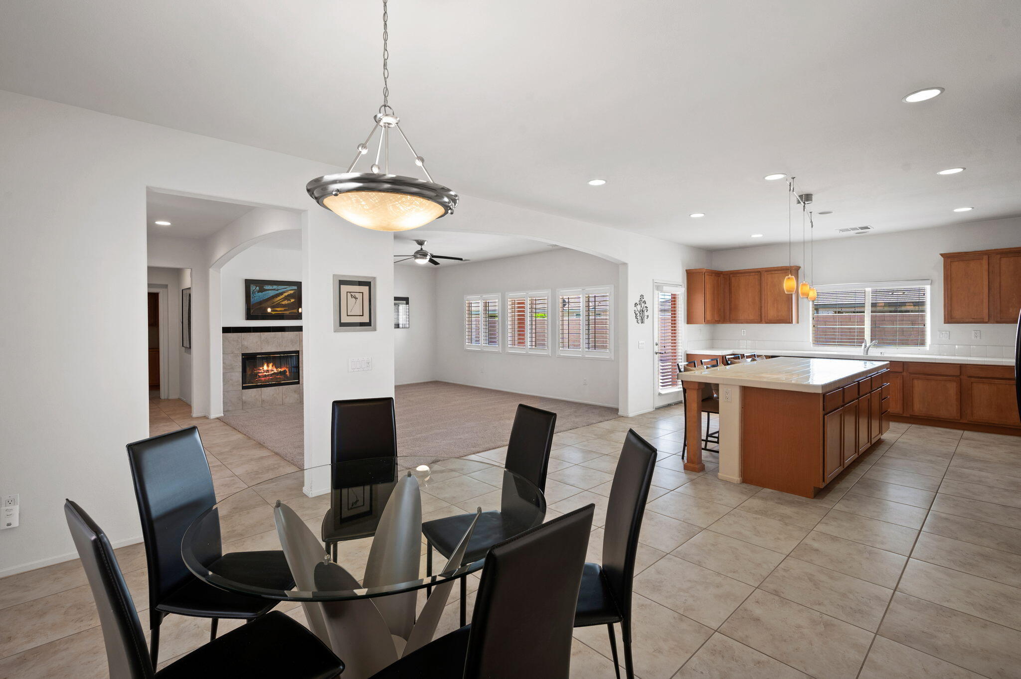 82809 Larsen Drive Indio, CA 92203 - Photo 13 of 34 a view of a dining room with furniture and wooden floor