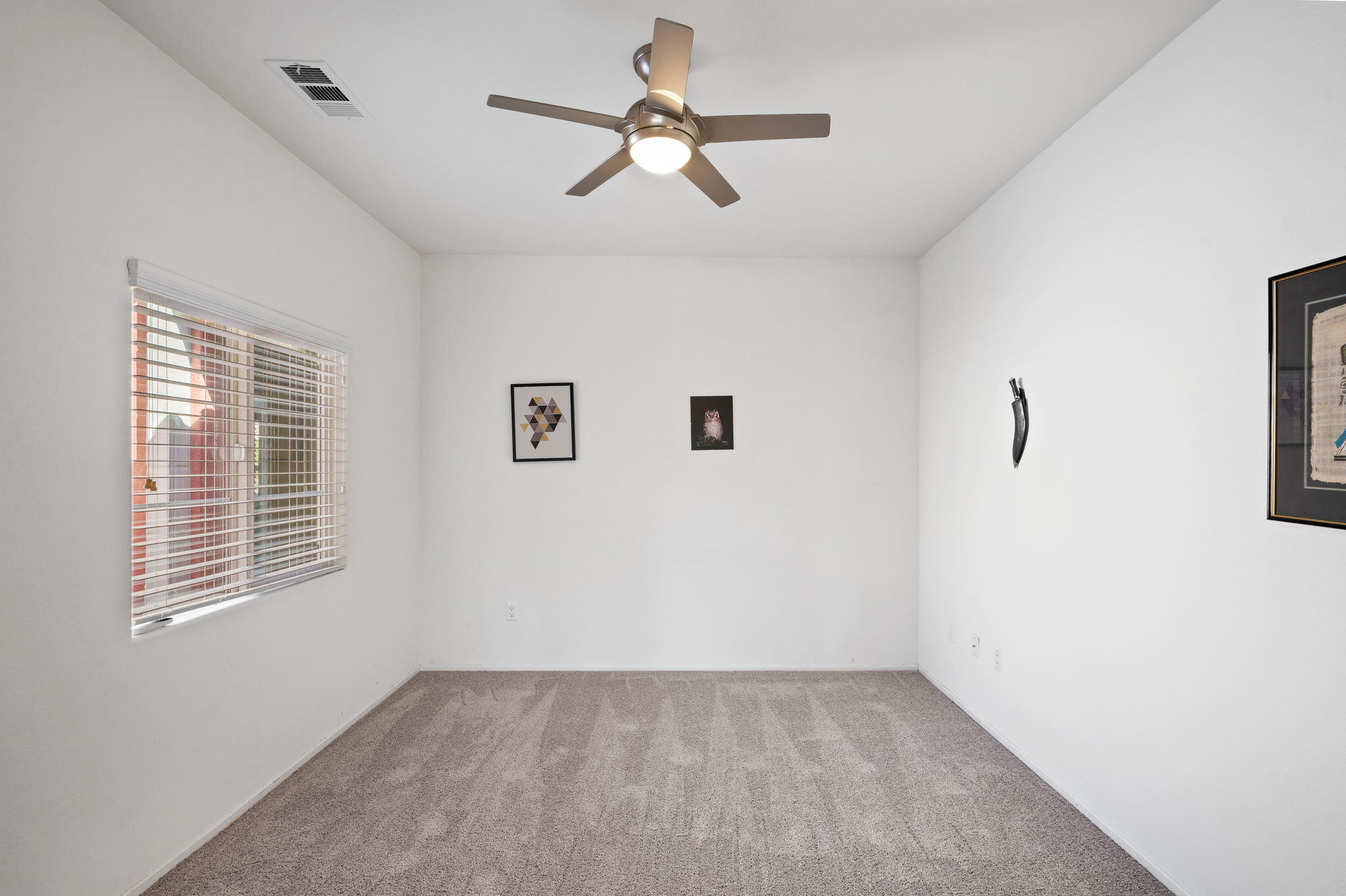 82809 Larsen Drive Indio, CA 92203 - Photo 15 of 34 a view of empty room with ceiling fan
