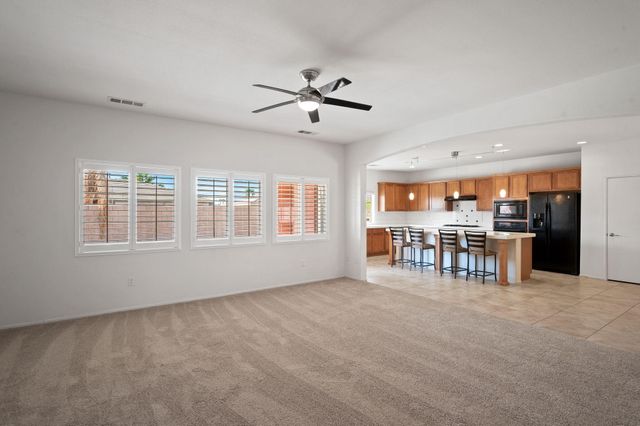 a view of a livingroom with furniture and window