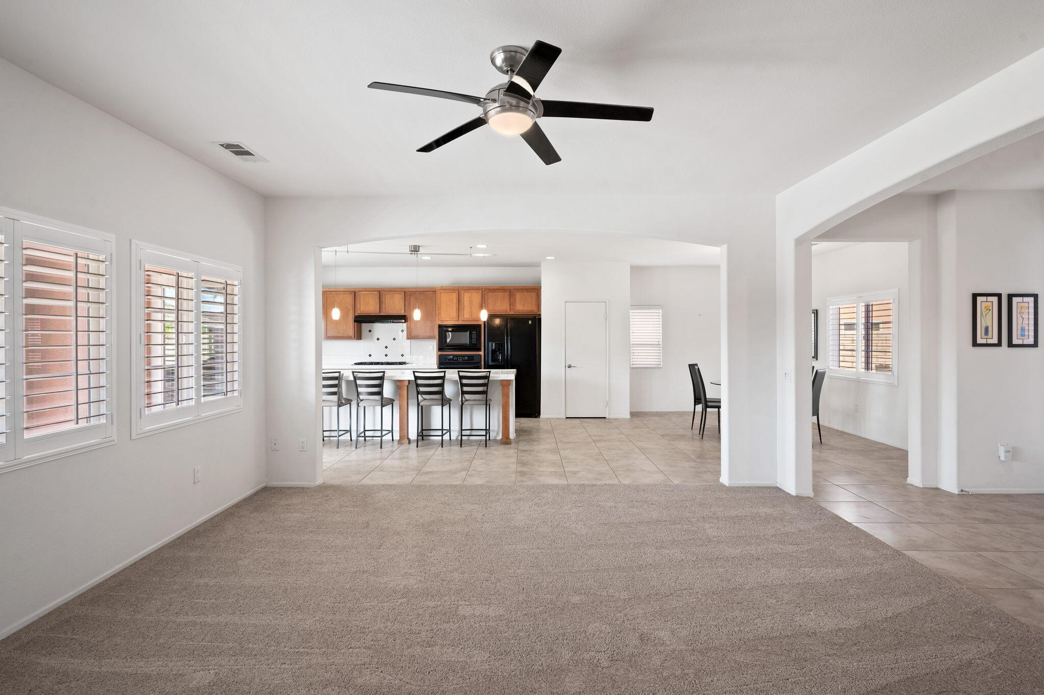 82809 Larsen Drive Indio, CA 92203 - Photo 7 of 34 a view of livingroom with furniture ceiling fan and window