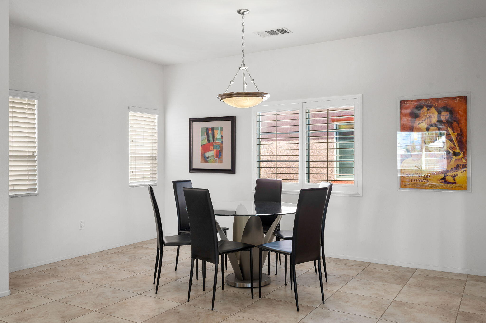 82809 Larsen Drive Indio, CA 92203 - Photo 10 of 34 a dining room with furniture and window