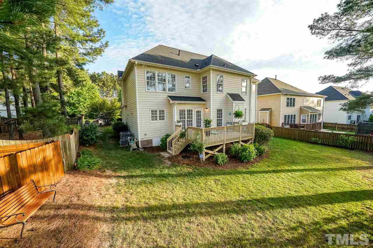 6033 Jones Farm Road Wake Forest, NC 27587 - Photo 5 of 30 Great backyard with nice sized lawn and mature trees.