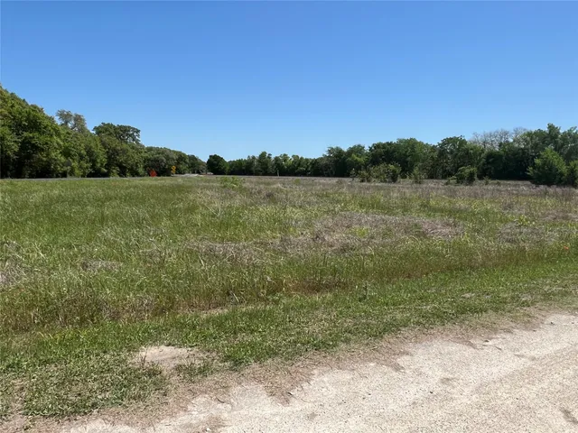 a view of lake with green space