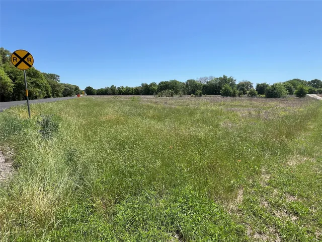 a view of a lake and a yard