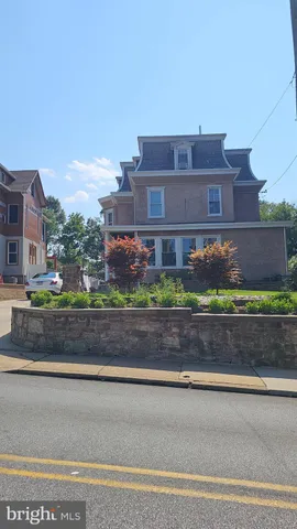 a view of a balcony with chairs