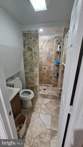 a swimming pool with outdoor seating and yard