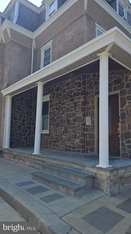 front view of a house with a street