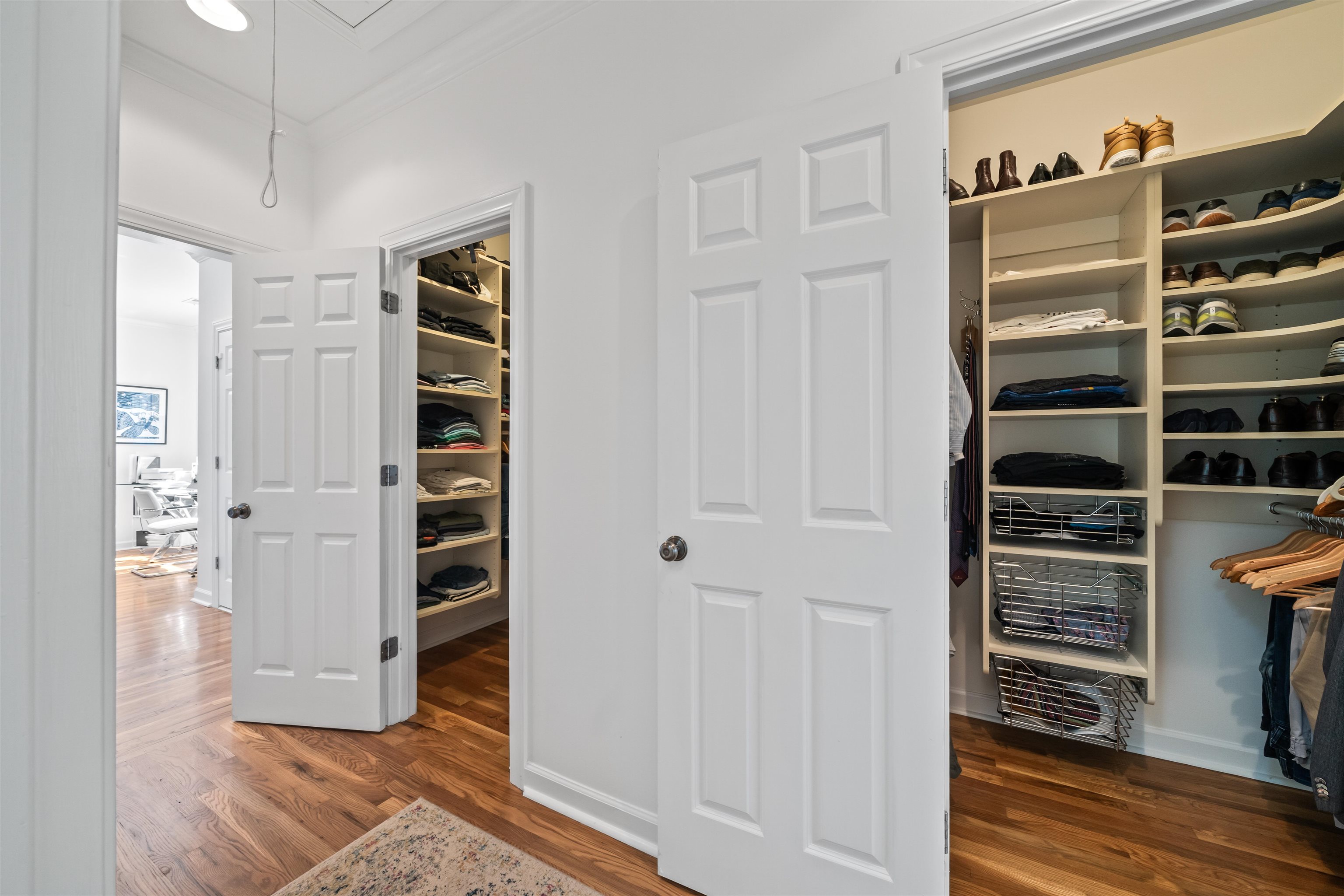 556 Rienzi Drive Memphis, TN 38103 - Photo 15 of 31 a view of walk in closet with clothes and shoes