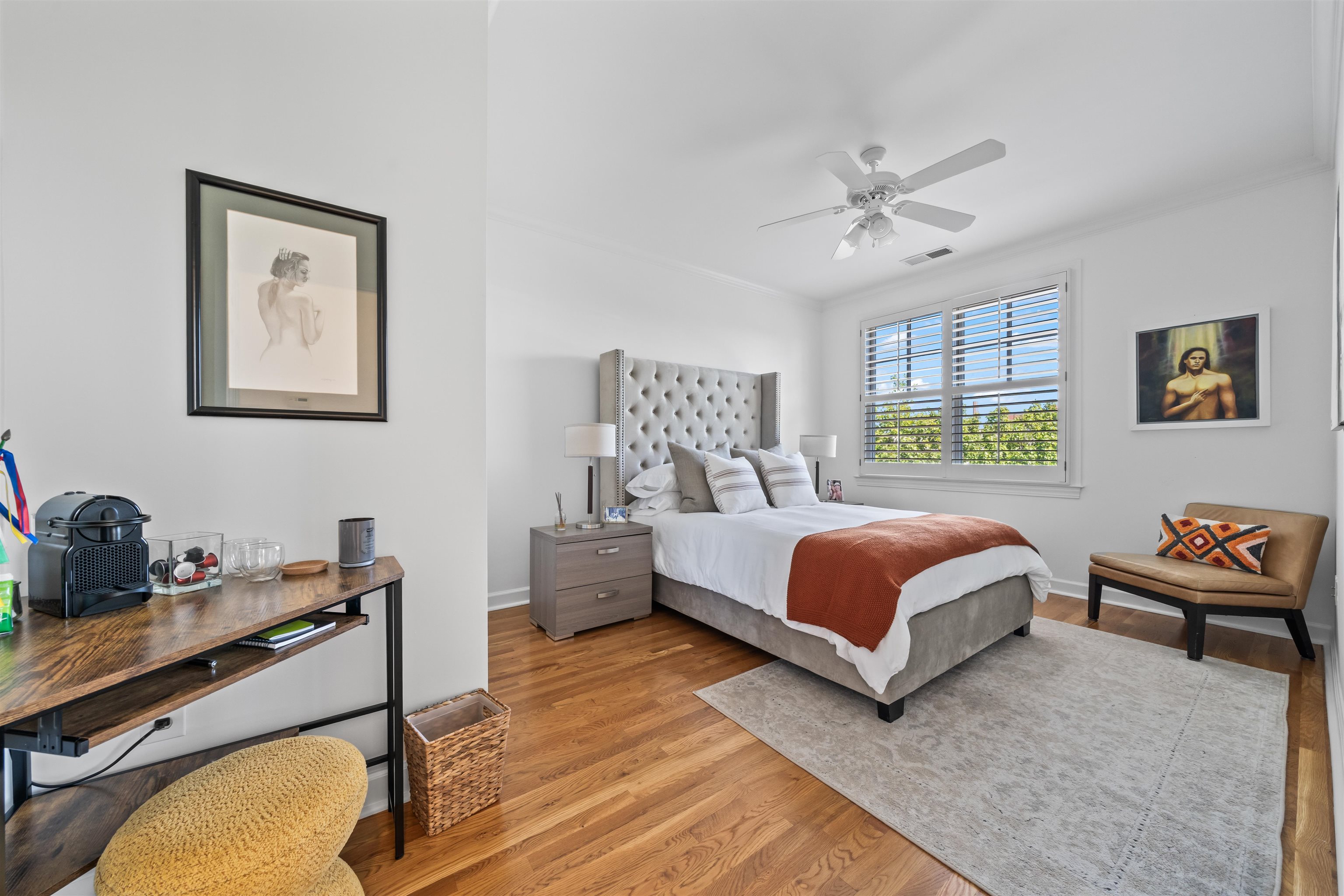 556 Rienzi Drive Memphis, TN 38103 - Photo 28 of 31 a bedroom with a bed and a chandelier