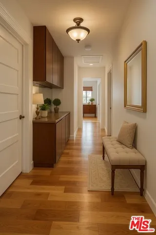 a kitchen with stainless steel appliances granite countertop a stove and a refrigerator