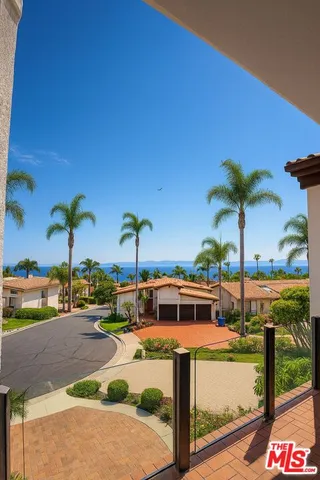 a view of a swimming pool with a chair