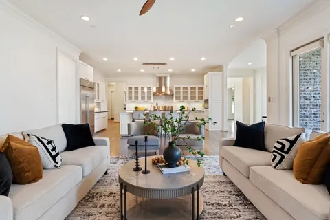 a living room with furniture and a couch