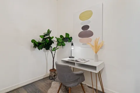 a vase with flowers sitting on a table