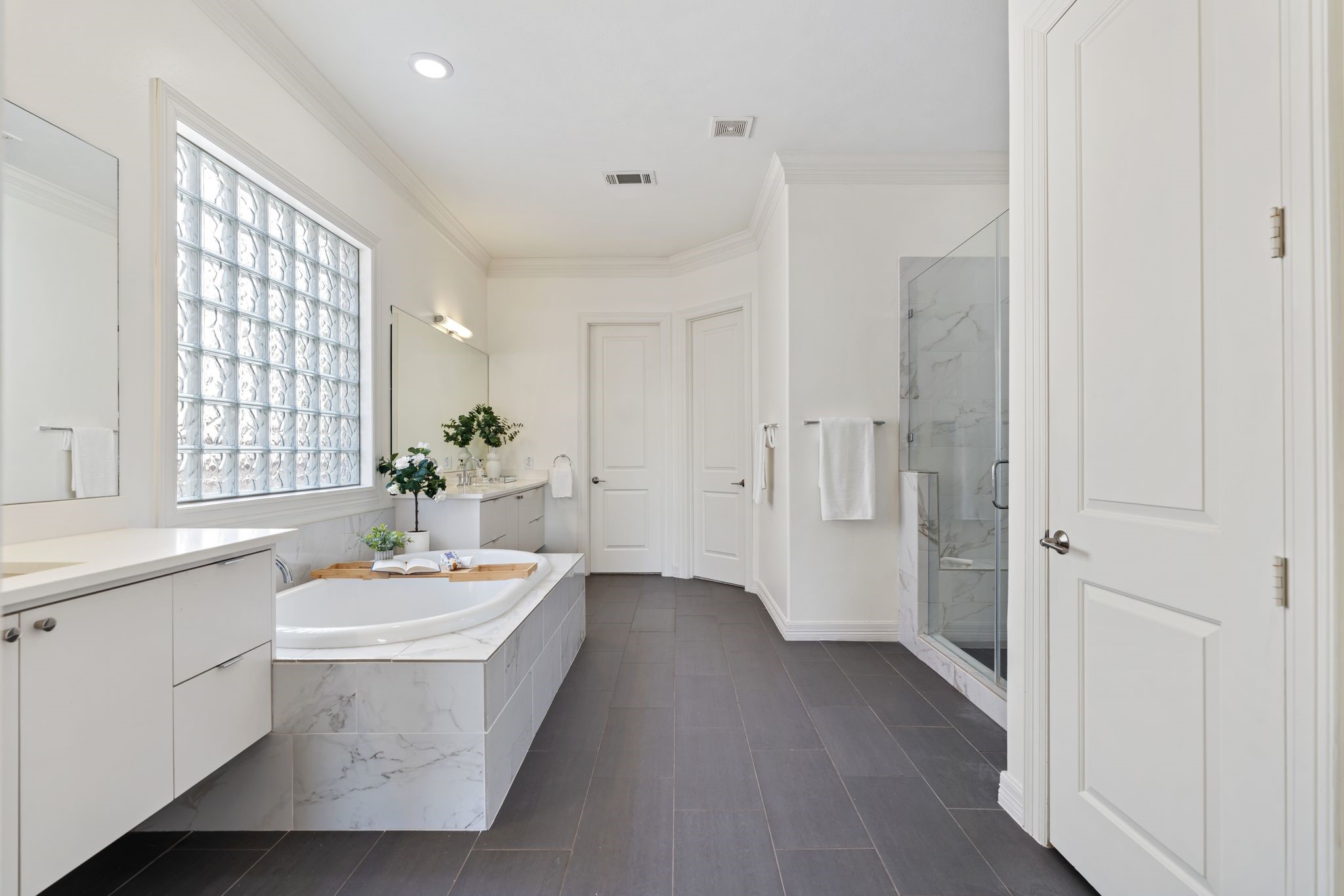 4822 Jason Street Houston, TX 77096 - Photo 26 of 45 a bathroom with a sink a toilet and shower