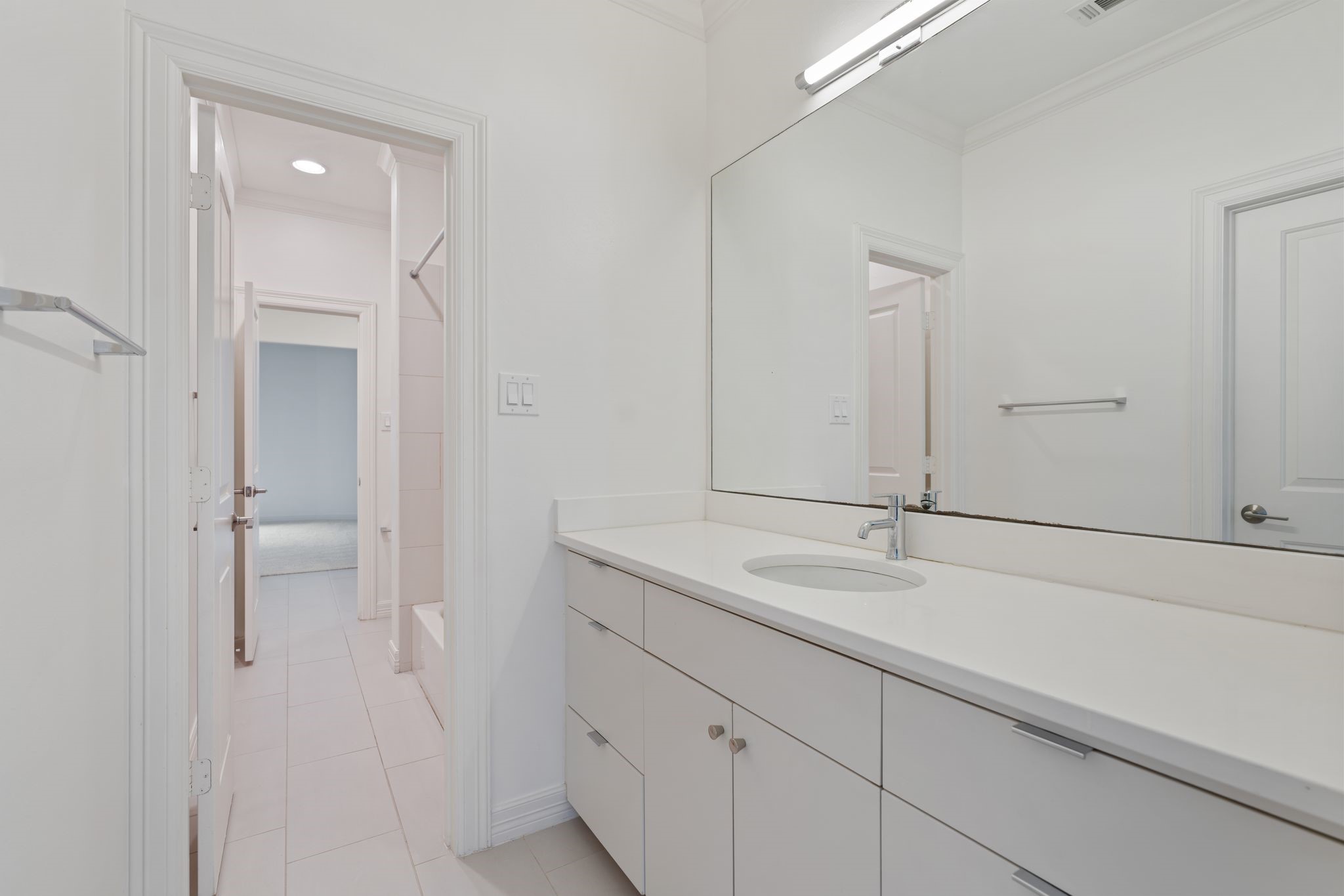 4822 Jason Street Houston, TX 77096 - Photo 37 of 45 a bathroom with a sink and a mirror