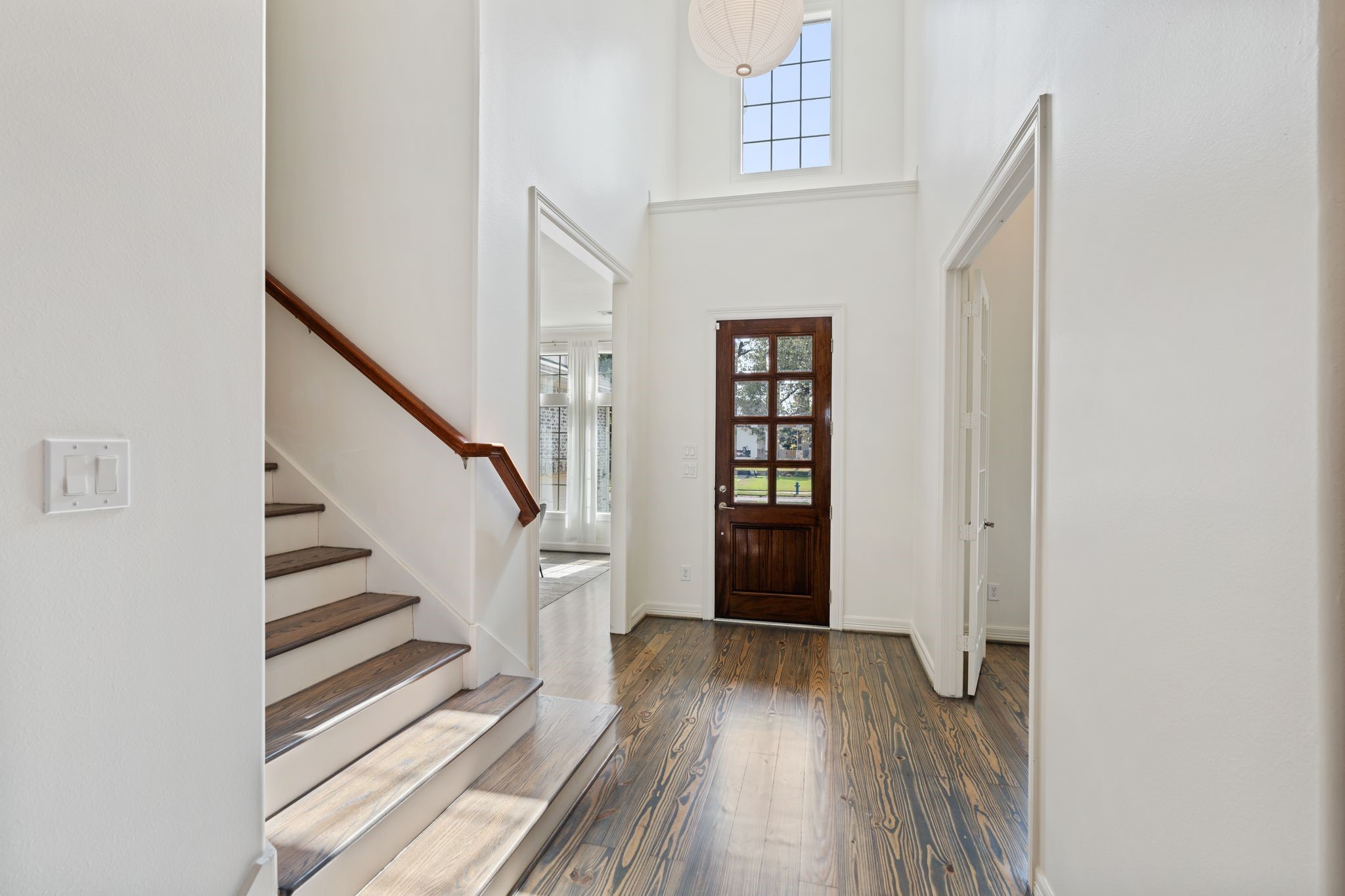 4822 Jason Street Houston, TX 77096 - Photo 5 of 45 a view of a hallway with wooden floor and entryway