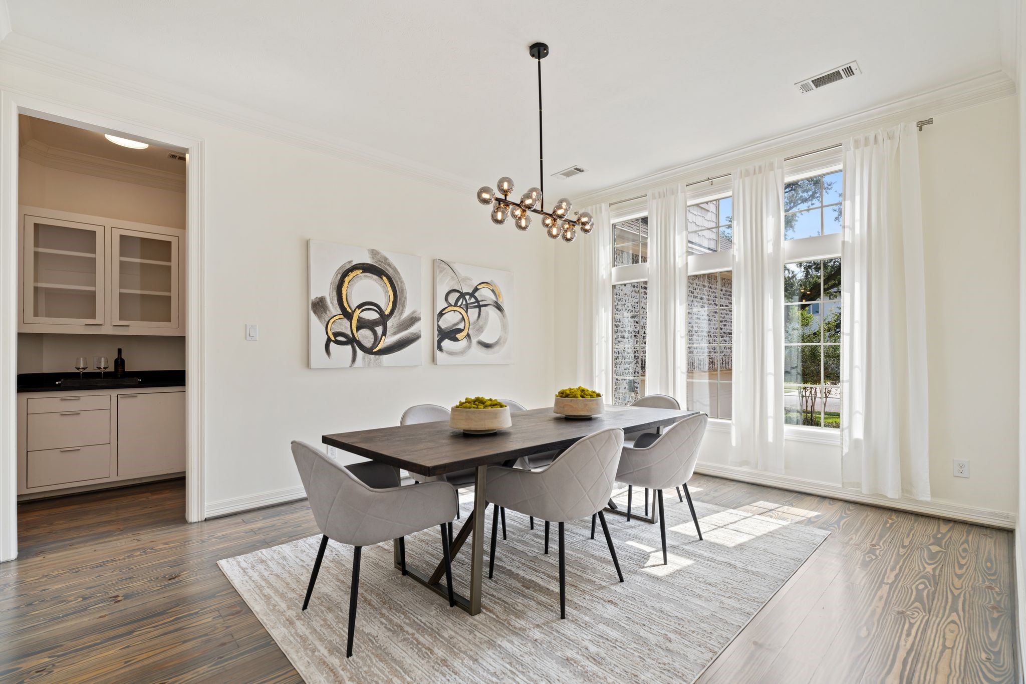 4822 Jason Street Houston, TX 77096 - Photo 6 of 45 a view of a dining room with furniture window and wooden floor