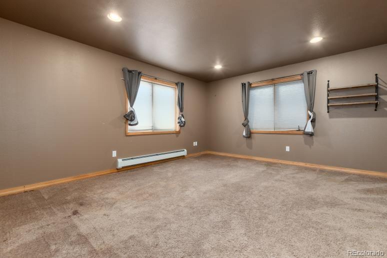 25876 County Road 5 Elbert, CO 80106 - Photo 29 of 43 an empty room with windows