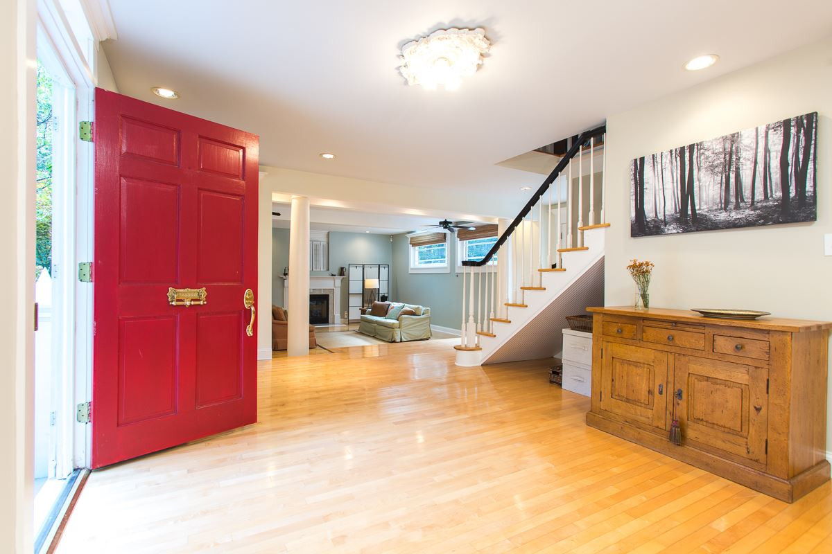 1715 Six Gables Road Durham, NC 27712 - Photo 10 of 25 Did you think we forgot all about the front door? Nah, we got one of those...and boy is it ever grand! Red, of course. Check out the brass antique-style mail slot. Swanky, right? No stairwell in the way as you welcome guests into this generous space. Entry Hall