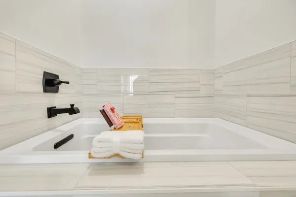 a bathroom with a bathtub