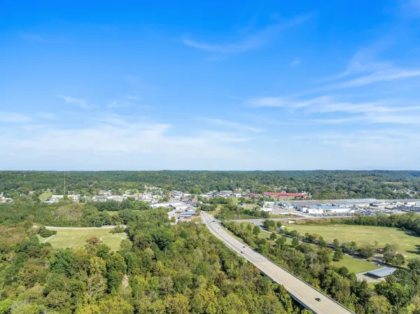a view of city with ocean