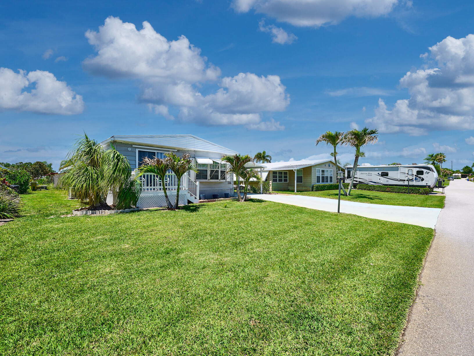 6977 Southeast Delegate Street Hobe Sound, FL 33455 - Photo 2 of 60 C PYL 0001