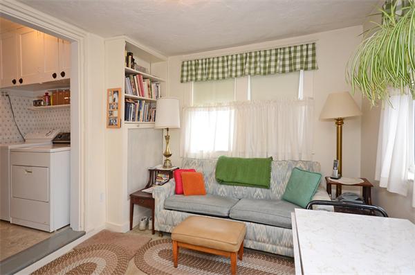 49 Katherine Road Watertown, MA 02472 - Photo 12 of 30 a living room with furniture and a window