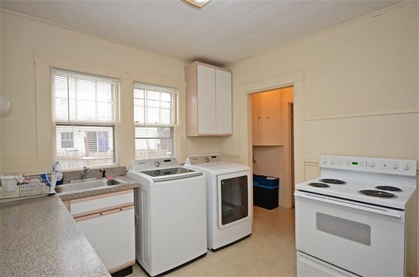 49 Katherine Road Watertown, MA 02472 - Photo 23 of 30 a view of kitchen with a sink stove and refrigerator