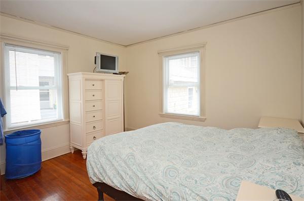 49 Katherine Road Watertown, MA 02472 - Photo 24 of 30 a bedroom with a bed and a window